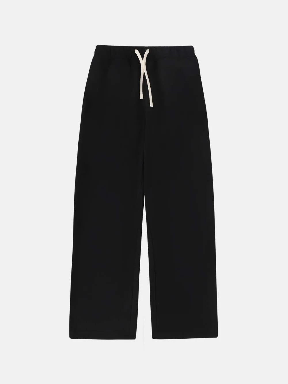 Man wearing black fleece-lined loose-fit sweatpants with an elastic drawstring waist