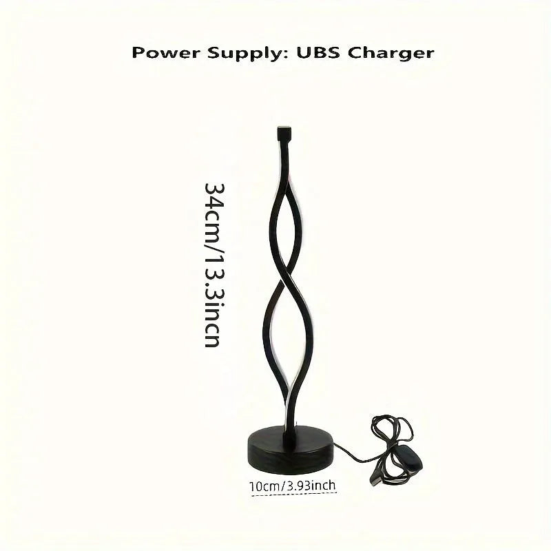 Black aluminium desk lamp with touch dimming controls and USB power cable