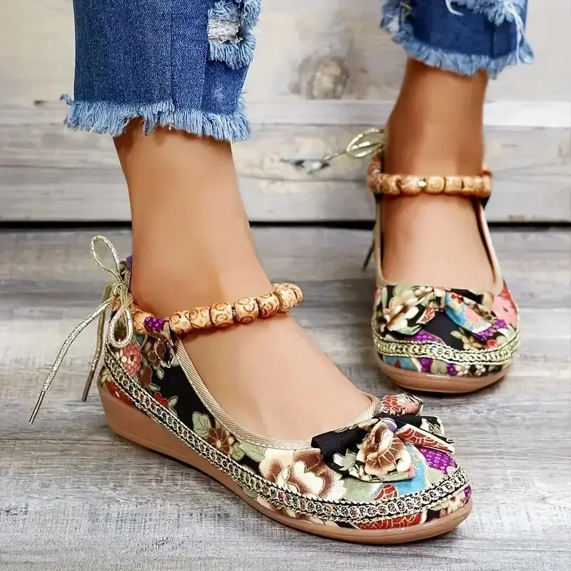 Women's plus size black ethnic platform sandals with elastic band and round toe on a PU sole.