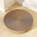 Round green cat scratching board with corrugated cardboard centre measuring 55cm diameter