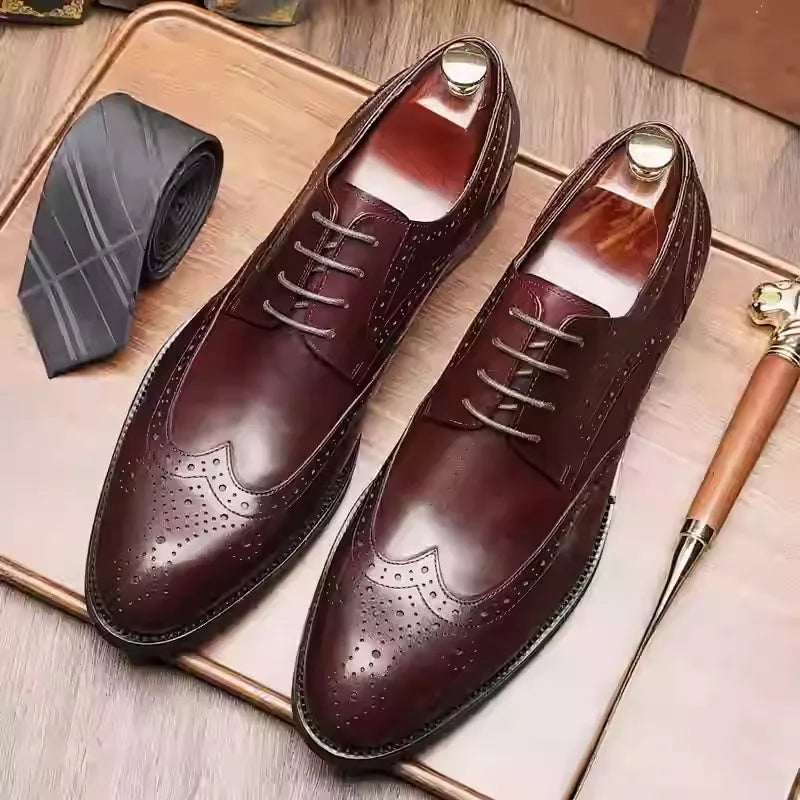 Men's burgundy British Brock pointed toe formal leather shoes on a white background.