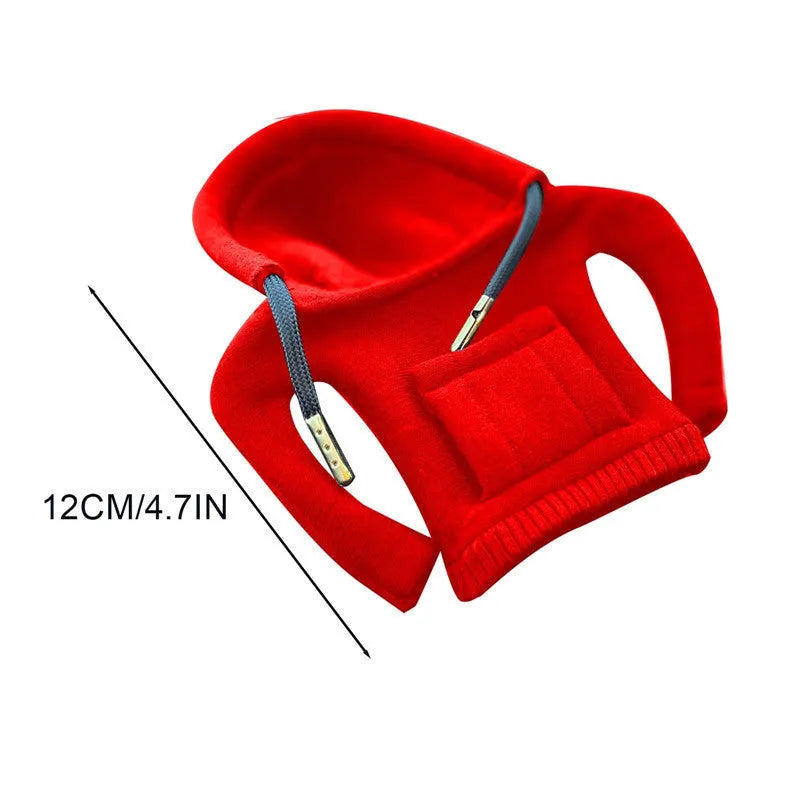 Pure cotton knitted gear lever sweater decoration in assorted colours on a car gear stick.