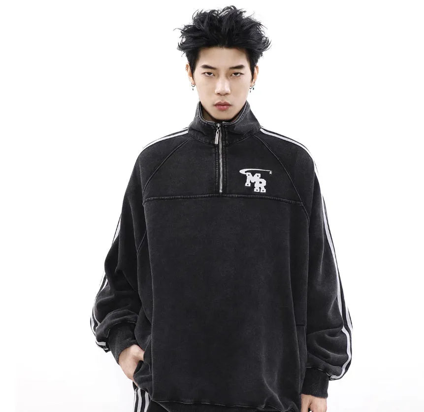 Black retro-style stand collar hoodie for couples on a mannequin, showing long sleeves and coat-style cut.