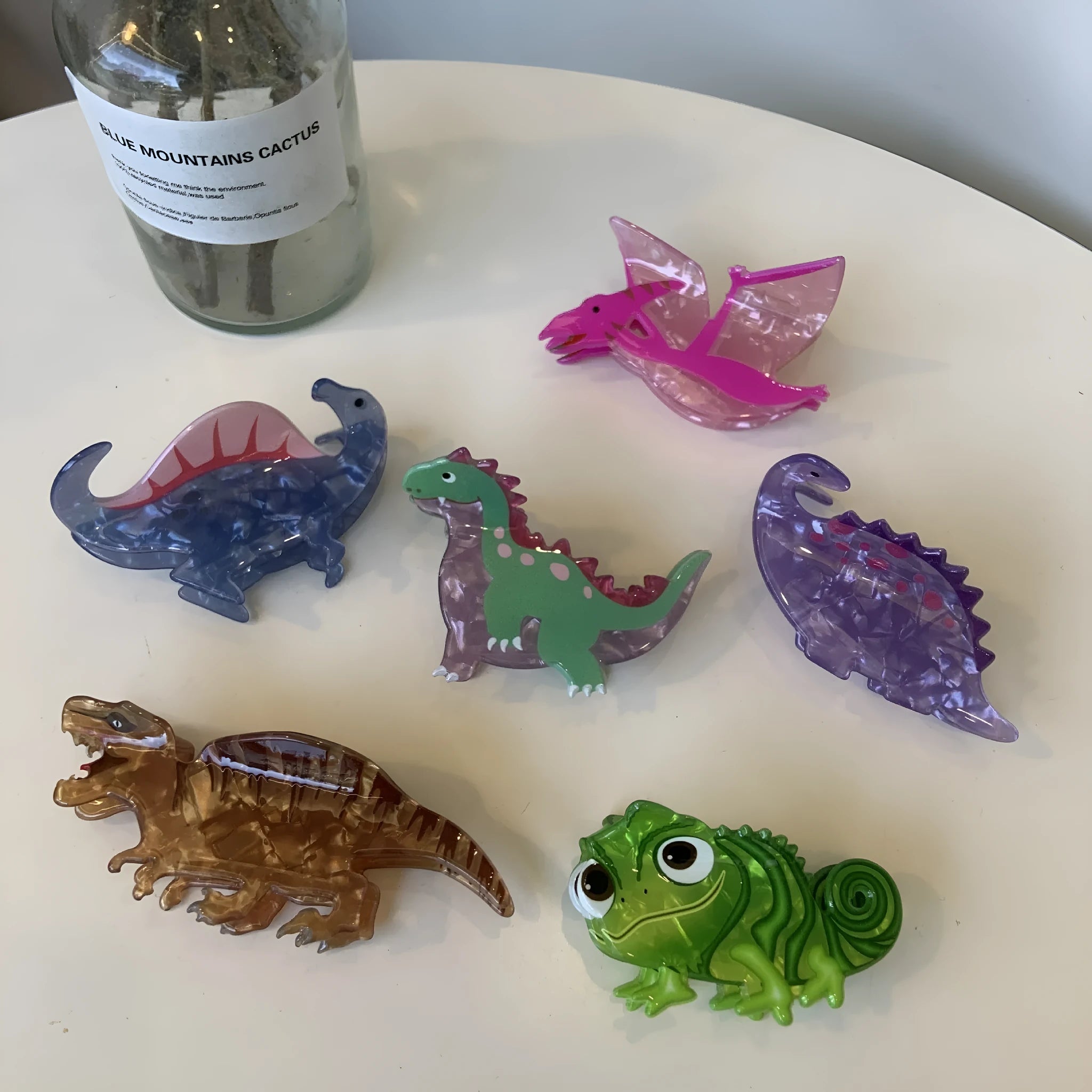 Acrylic dinosaur jaw hair clip in pink pterosaur colour with grip fastening mechanism