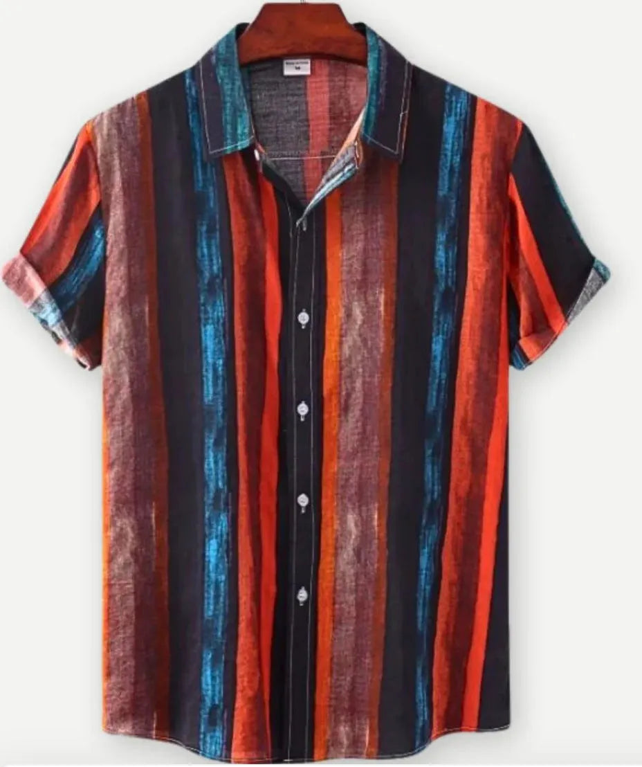 Man wearing a short sleeve lapel collar Hawaiian shirt with a blue floral print.