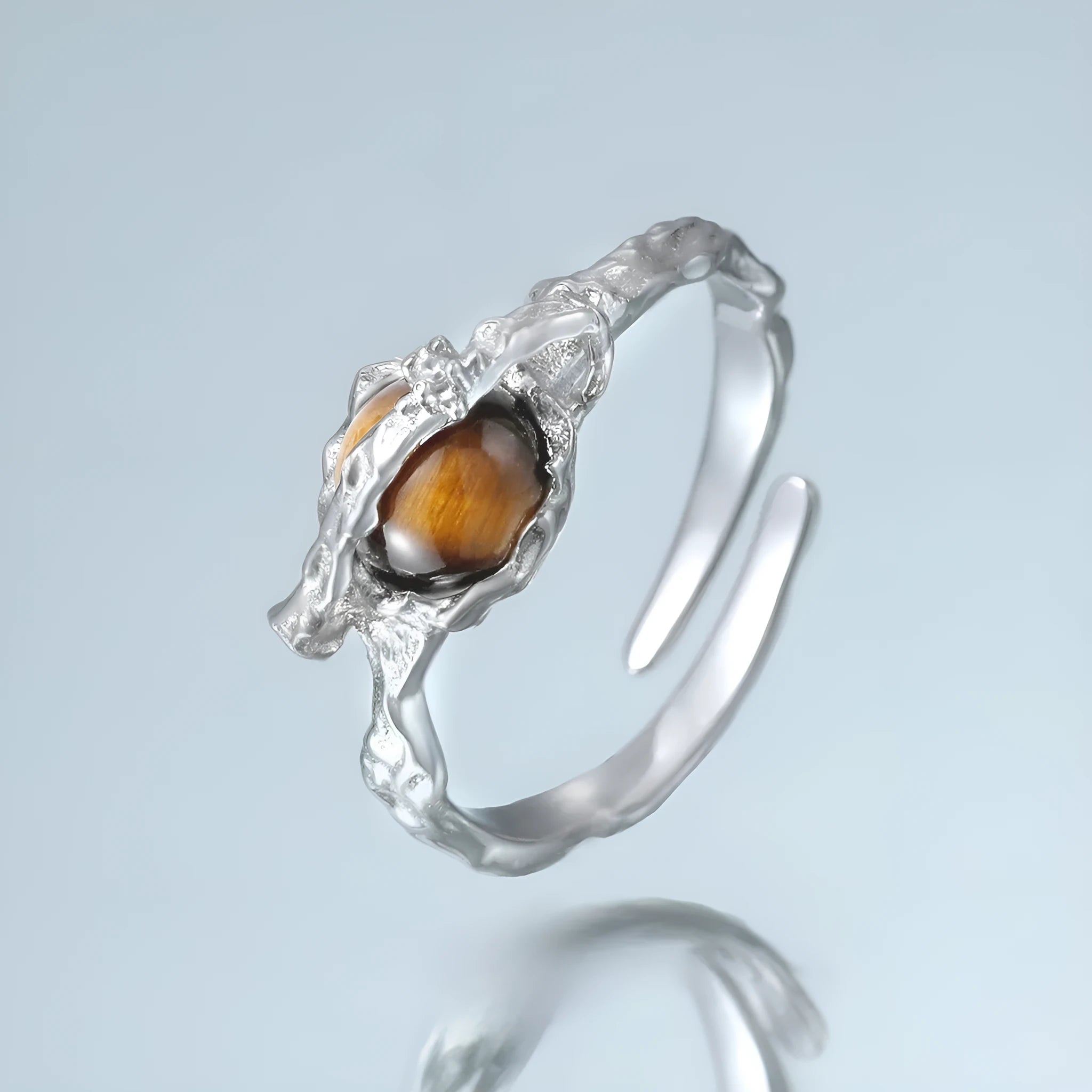 Women's adjustable Saturn tigereye open ring with electroplated white gold colour finish on silver