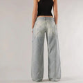Blue loose straight wide leg cotton trousers with low waist and stitching details