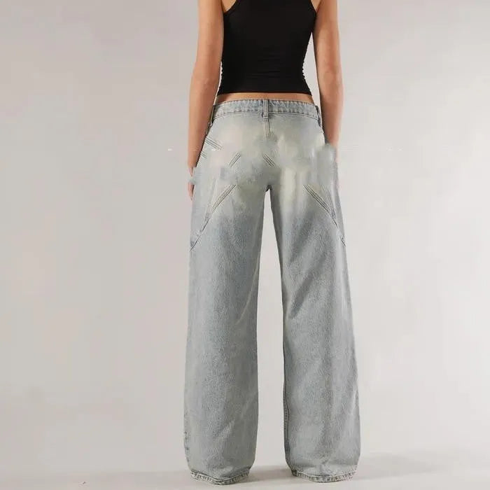 Blue loose straight wide leg cotton trousers with low waist and stitching details