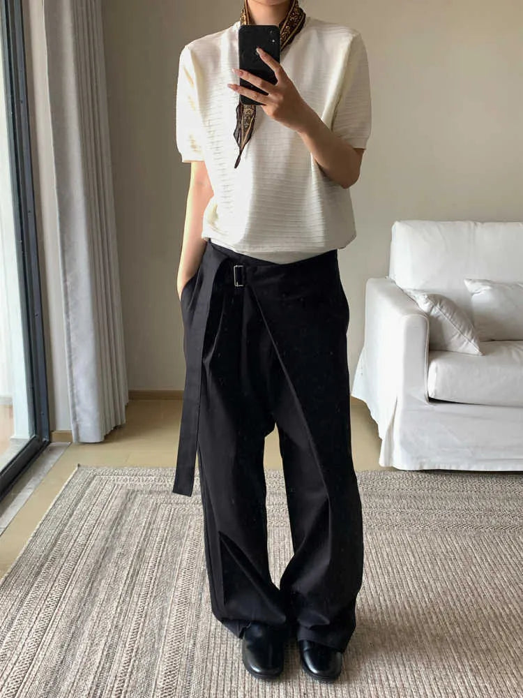 Black straight-leg trousers with a single front pleat and adjustable waistband, laid flat.