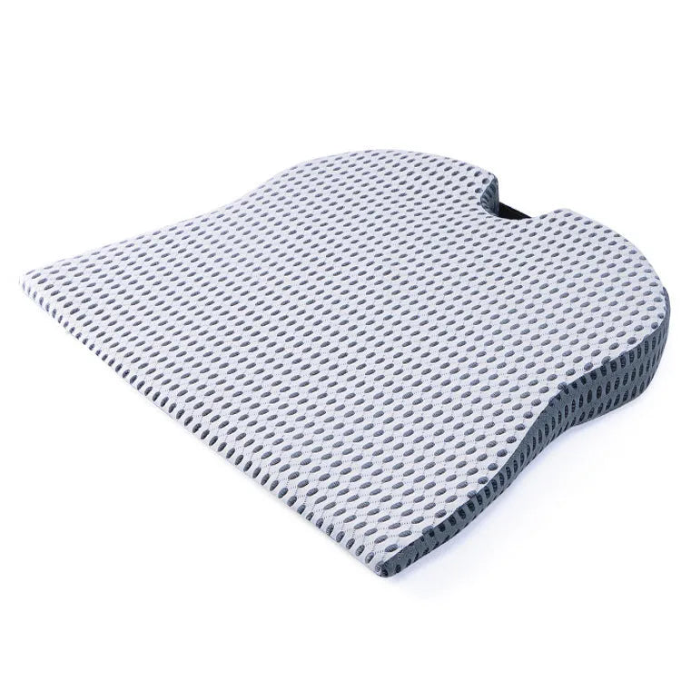 Memory foam seat cushion in grey with elastic strap on a car seat