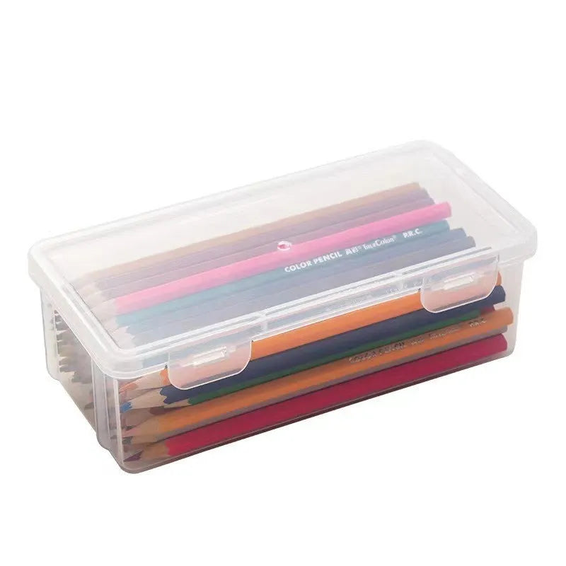 Large clear plastic pencil storage box filled with colouring pencils and crayons.