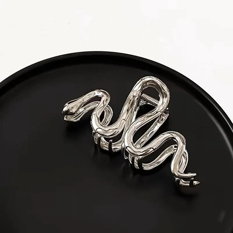 Slytherin serpentine metal hair barrette measuring 10.5 cm with electroplated finish