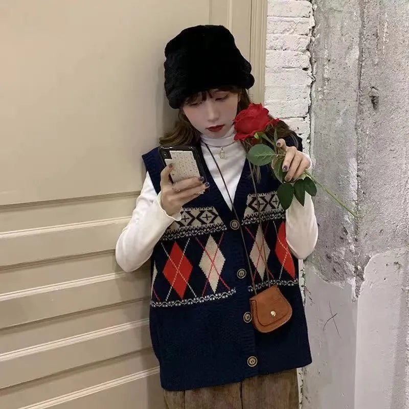 Sleeveless loose cardigan with diamond plaid pattern in khaki colour showing front view