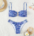 Women's floral print bikini swimsuit with high-waisted briefs in orange, blue, and rose red colours