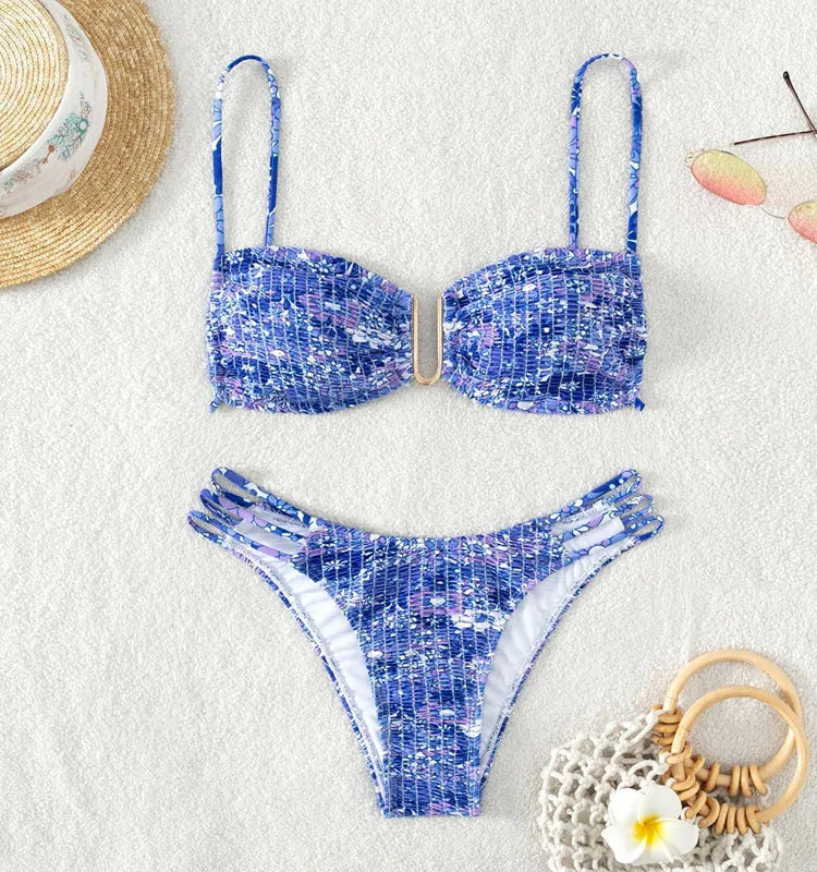 Women's floral print bikini swimsuit with high-waisted briefs in orange, blue, and rose red colours