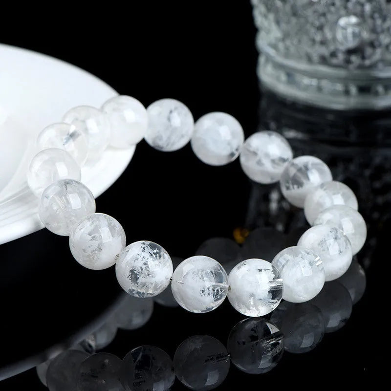 Women's natural blizzard snowflake round crystal bead bracelet with Ruyi and Xiangyun design.