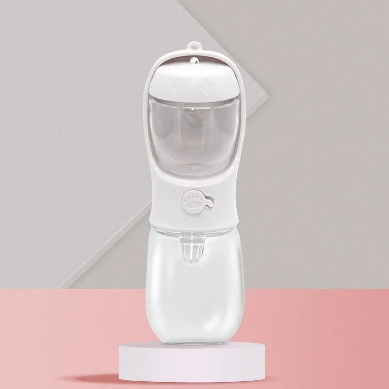 Portable blue dog water bottle with integrated drinking bowl showing split water grain design