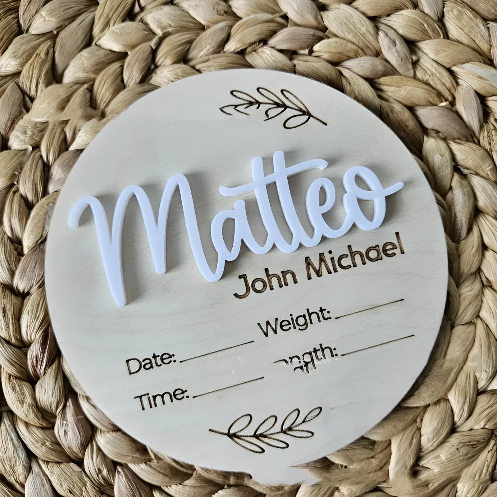 Square wooden baby name plaque showing birth information, 15cm on each side.