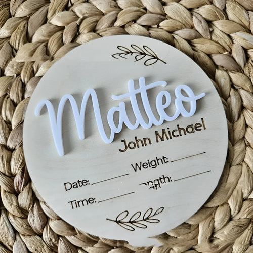 Square wooden baby name plaque showing birth information, 15cm on each side.