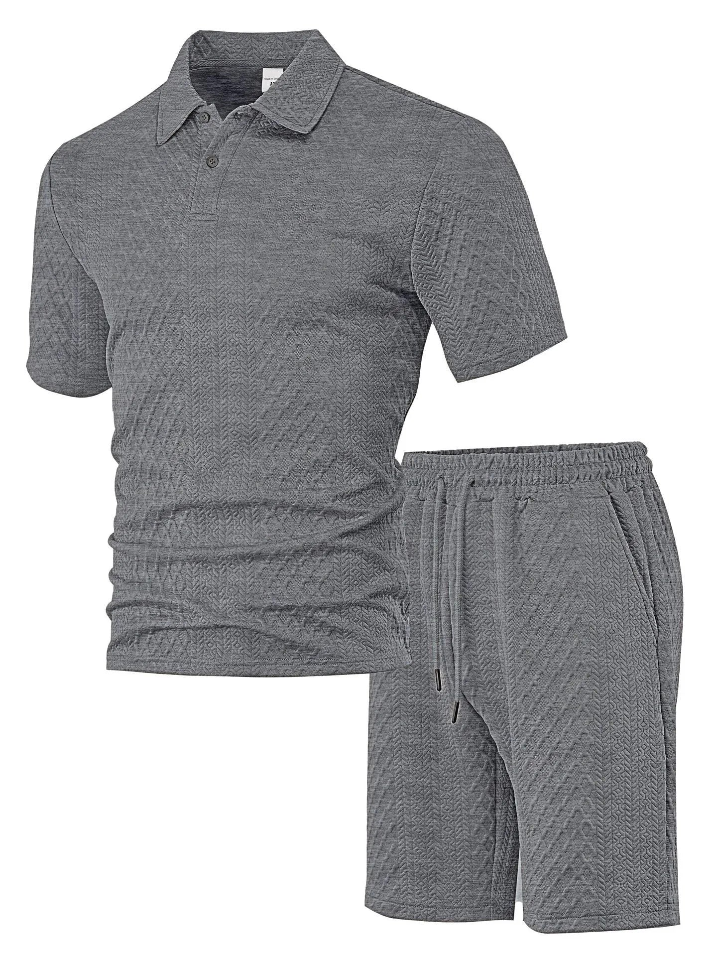 Men's patterned cloth casual suit set featuring a short sleeve polo shirt and trousers on a hanger.