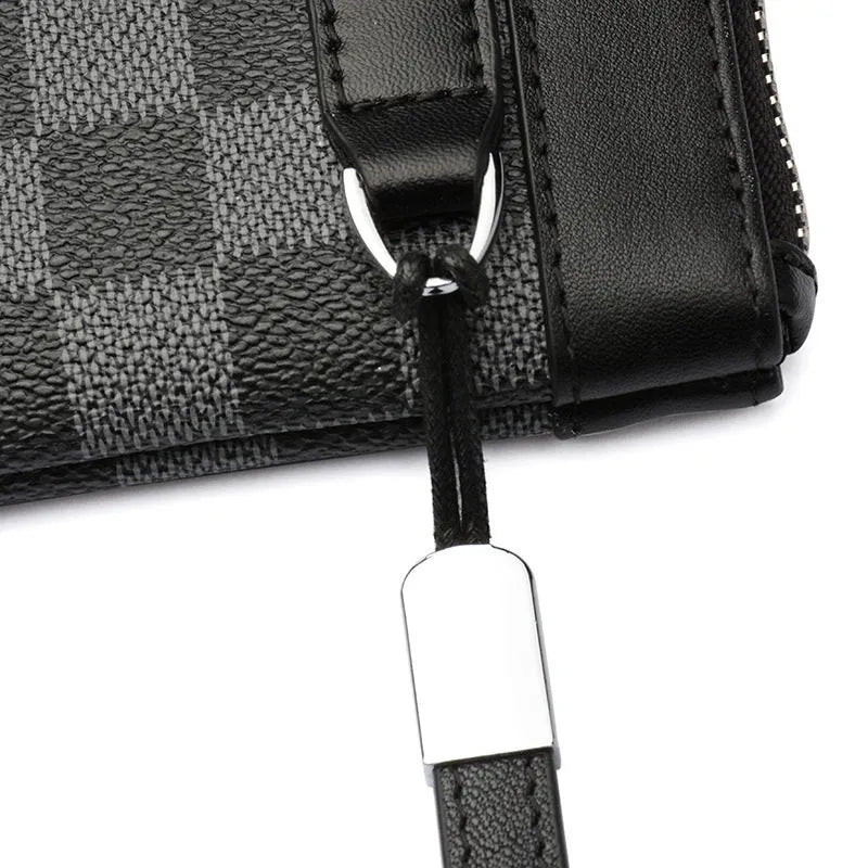 Black leather plaid clutch wallet showing first layer cowhide texture and polyester lining