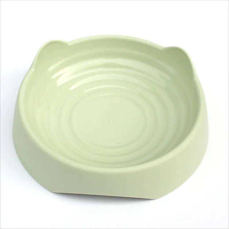 Ceramic dog slow feeder bowl with puzzle maze design in blue, green, or pink