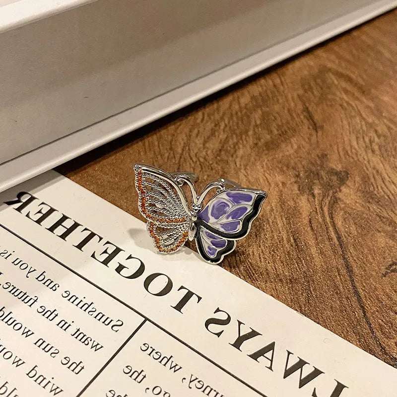 Copper Chinese butterfly women's ring showing creative design with oil dripping treatment finish