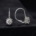 White gold plated sterling silver flower bud clip earrings with moissanite stone
