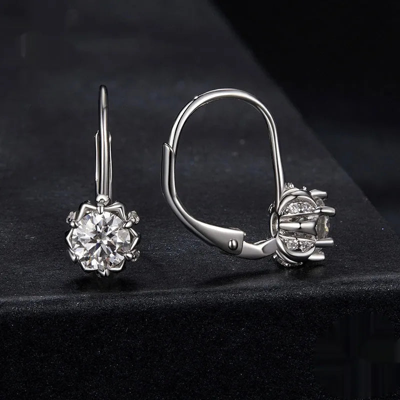 White gold plated sterling silver flower bud clip earrings with moissanite stone