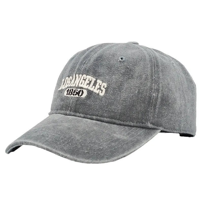 Personalised embroidered retro-style peaked cap in distressed beige with adjustable strap