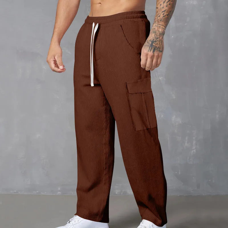 Men's straight-leg corduroy cargo trousers in navy blue with a drawstring waist.