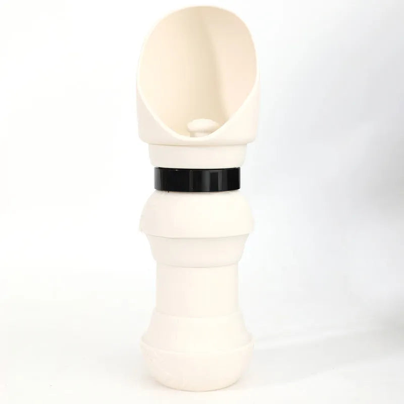 Silicone folding pet water cup shown both expanded as bowl and collapsed flat, 550ml capacity