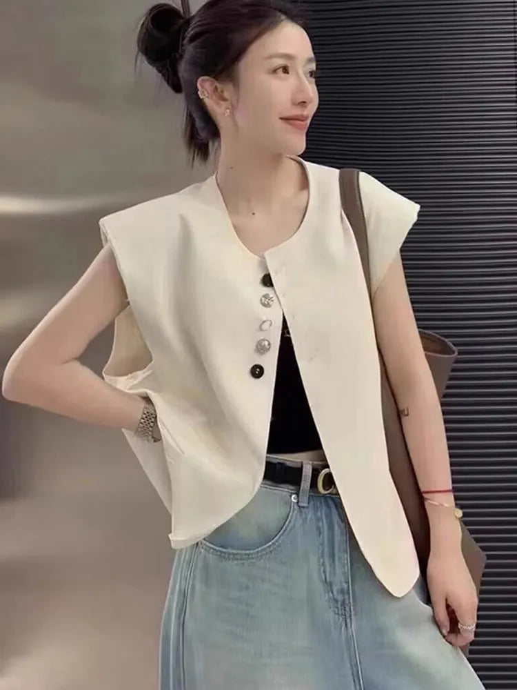 Women's loose fit polyester vest with pocket in milky white or black, 40cm short length