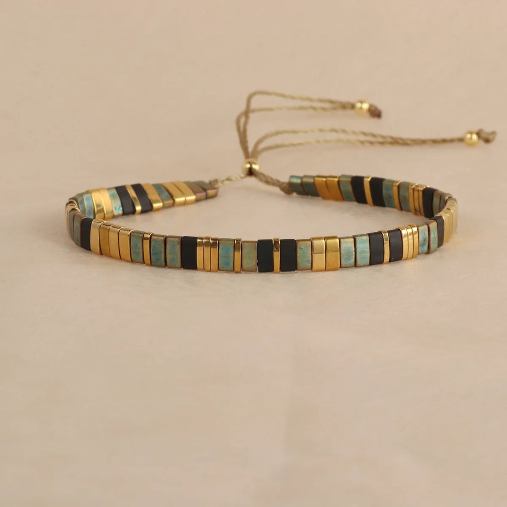 Glass and coloured glaze beaded bracelet with geometric round beads in five colour options