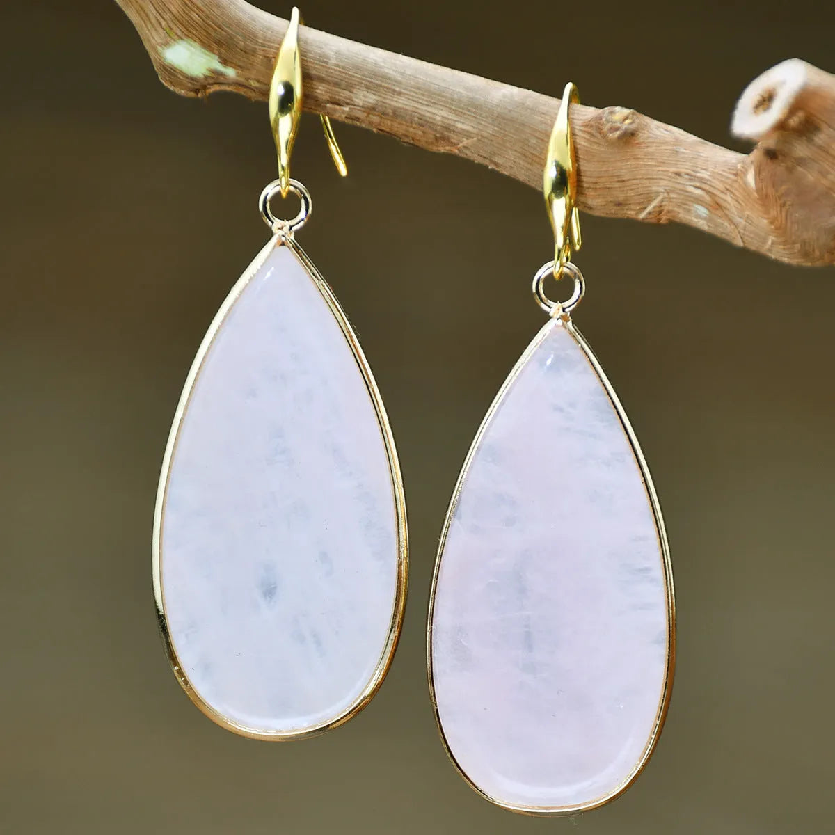 Vintage tigereye stone drop earrings with elongated water drop shape and textured elements
