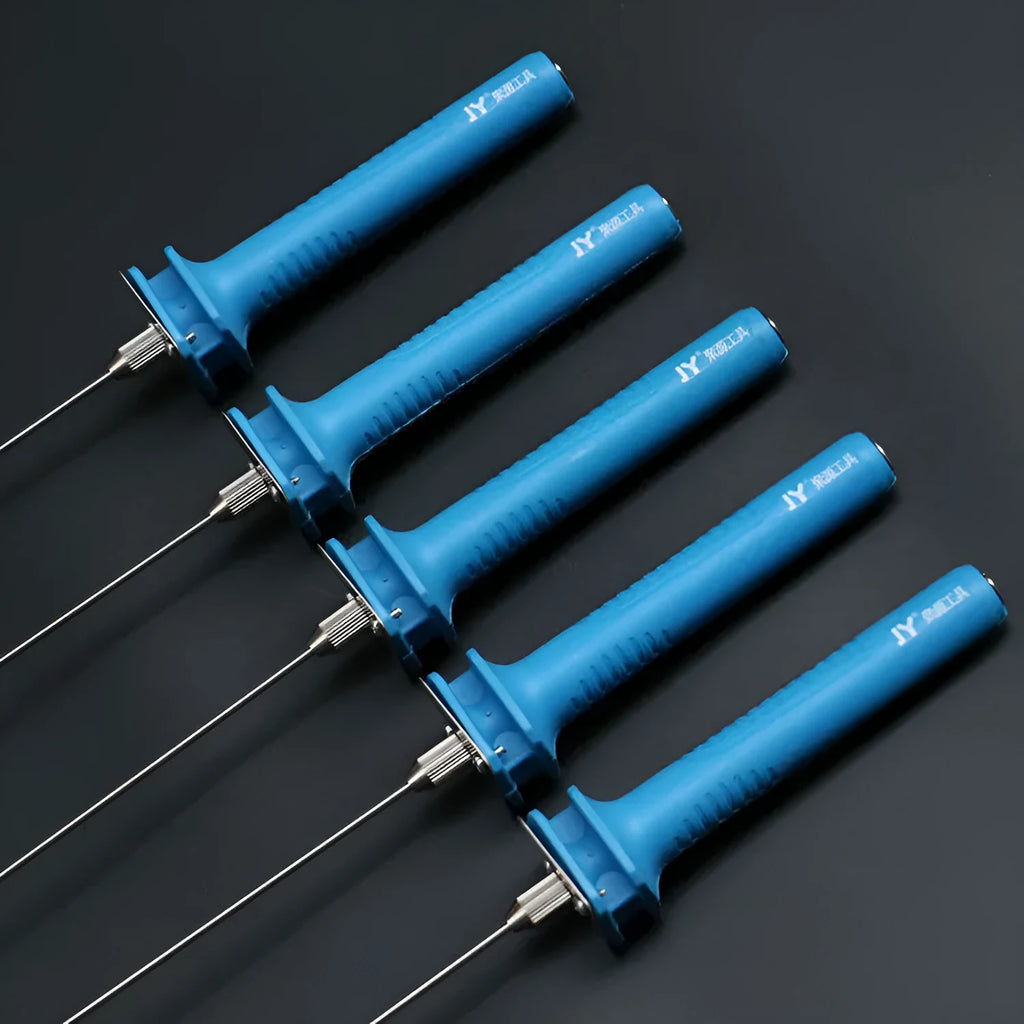 Blue plastic-handled electric foam cutter pen with adapter on a work surface.