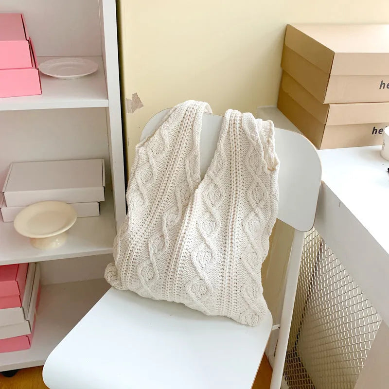 Retro hollow knitted polyester tote bag in a solid colour with double shoulder straps.
