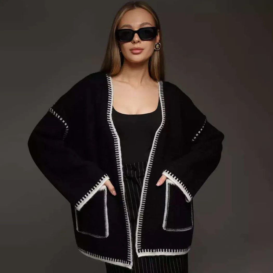 Lace-up front knitted cardigan in imitation cashmere fabric showing loose fitting design and long sleeves