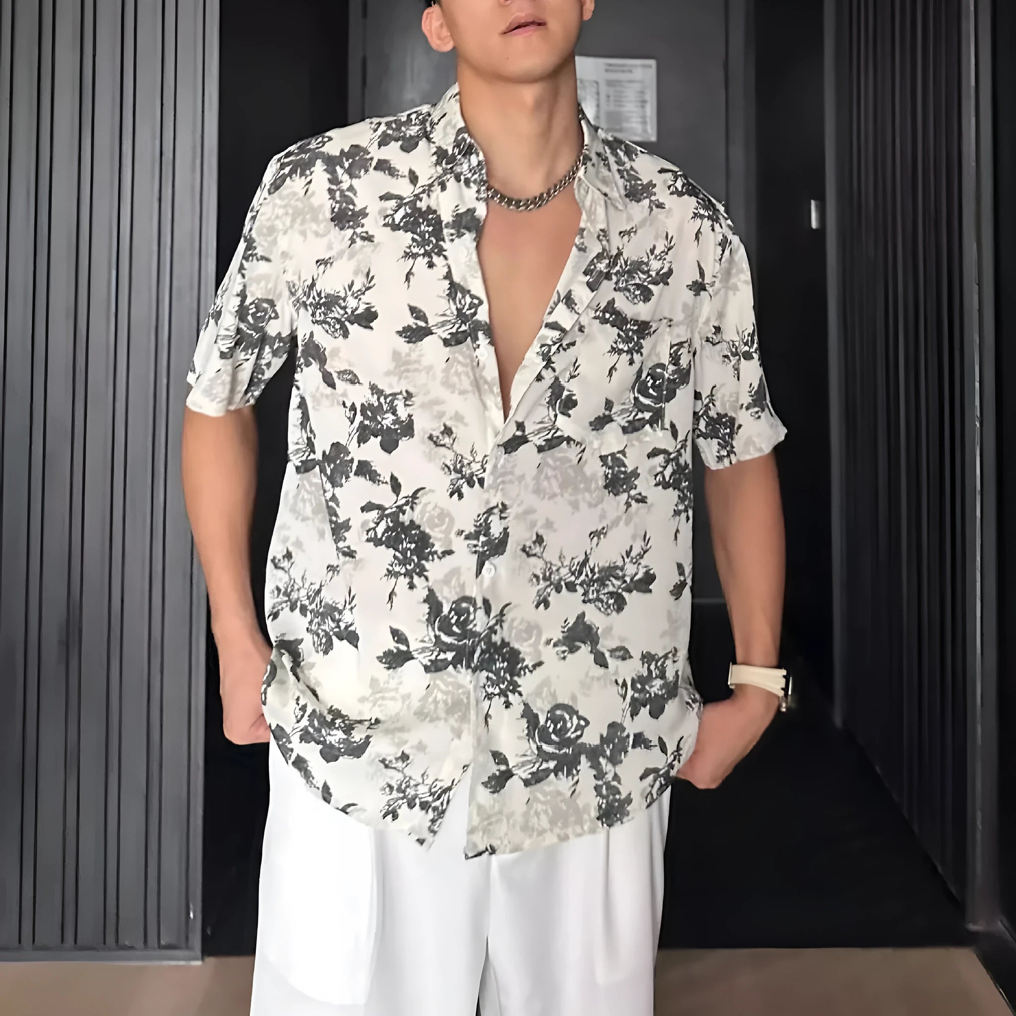 Floral printed short sleeve shirt in loose casual pendant style shown in white and black options