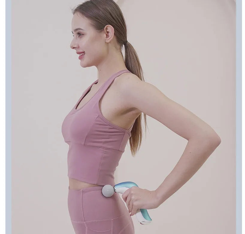 Mini electric massage gun with hot compress, LCD screen, and three massage heads in pink
