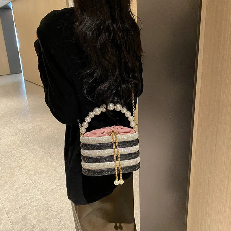 Round women's crossbody bag in PU leather with pearl bead decoration and single shoulder strap