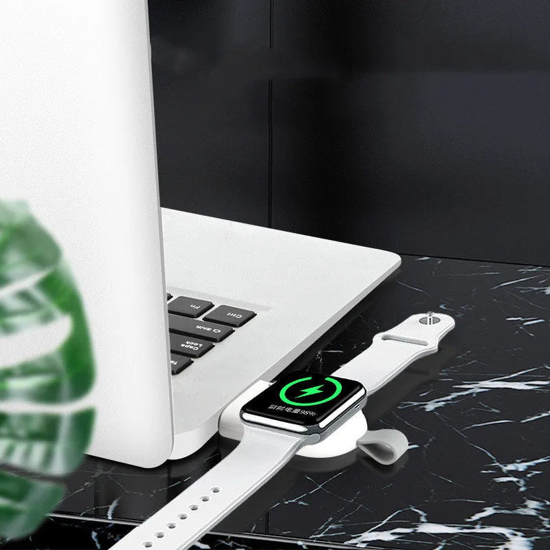 Portable wireless charger dock for Apple Watch in white, with USB cable and compact ABS body
