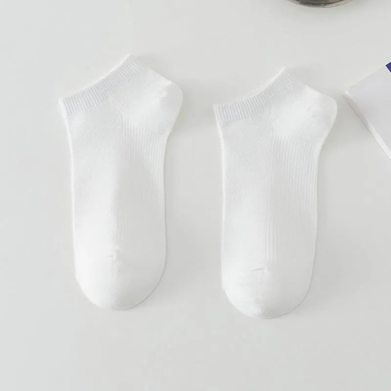 Men's solid colour polyester low-cut boat socks shown in one of six available colour options
