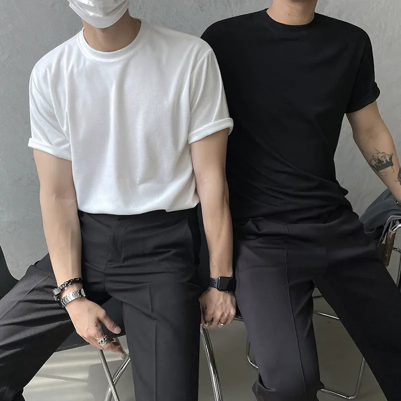 Men's slim fit cotton T-shirt in black or white with round neck and half sleeves