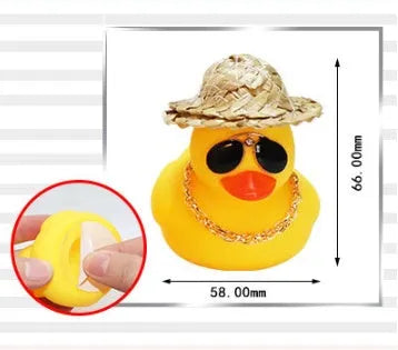 Yellow duck car dashboard ornament with straw hat, matte finish, and included adhesive base with sunglasses necklace