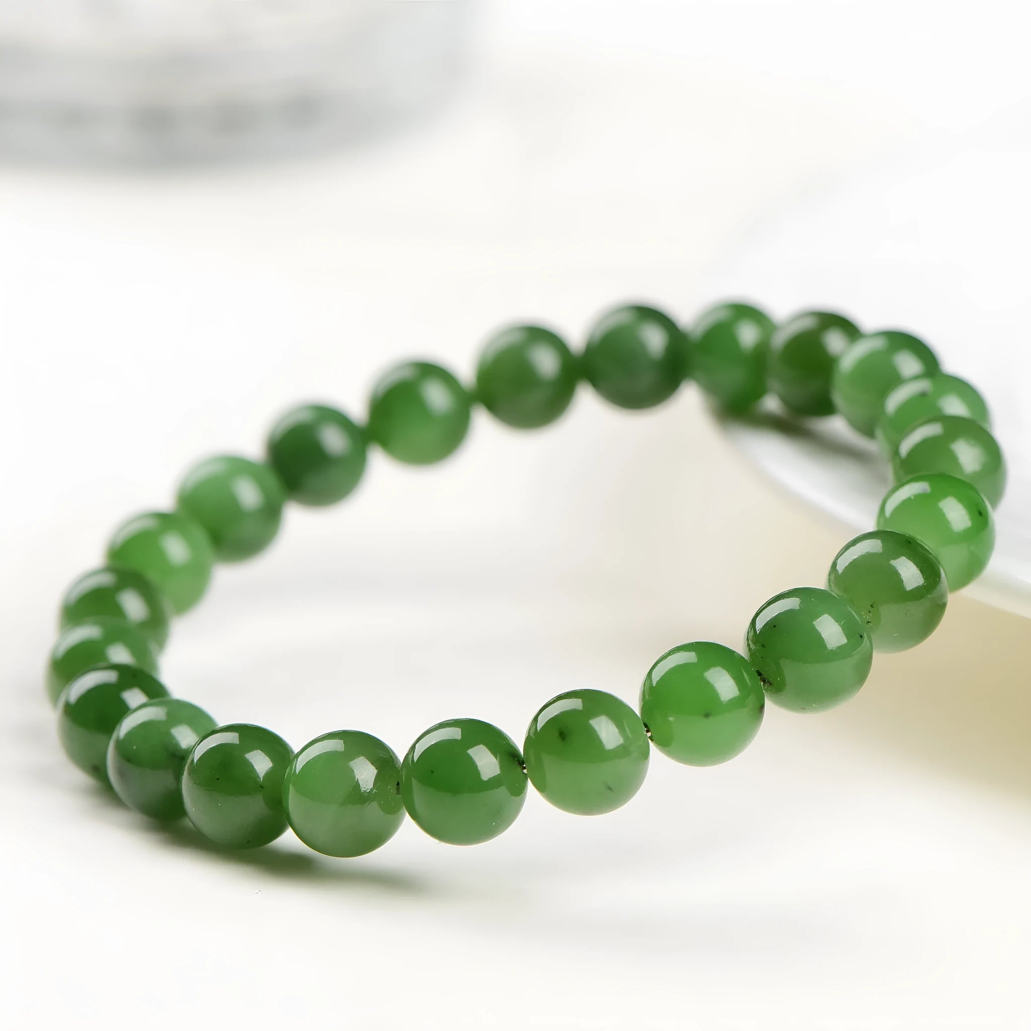 Natural jasper bead bracelet handcrafted from Hetian jade with polished stones