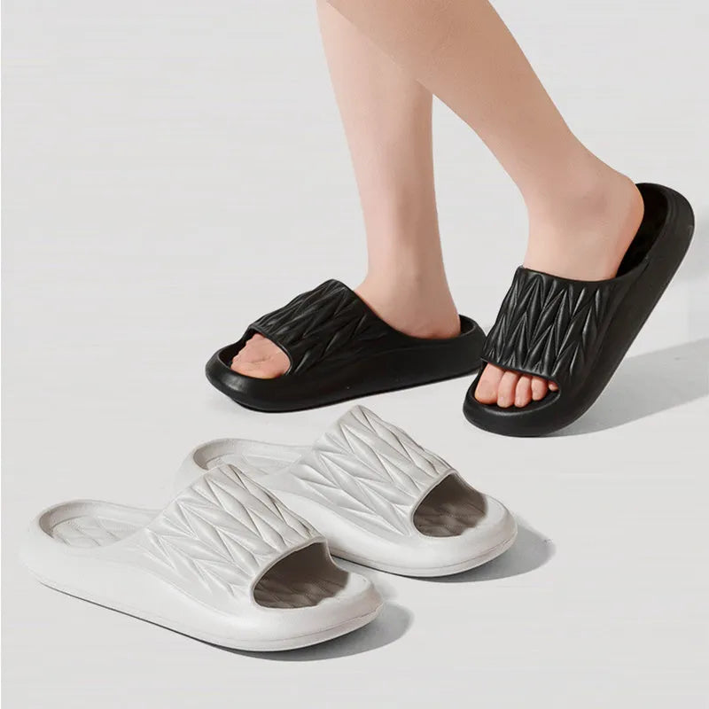 Leaf texture design EVA indoor slippers in multiple colours on a white background.