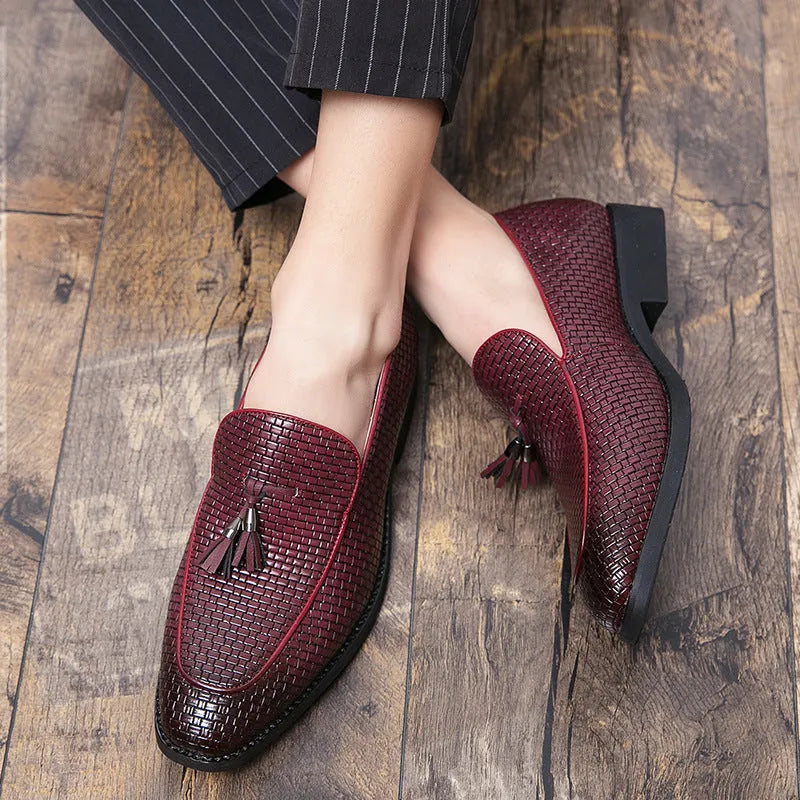 Men's black pointed toe slip on shoes with tassel detail on artificial PU upper