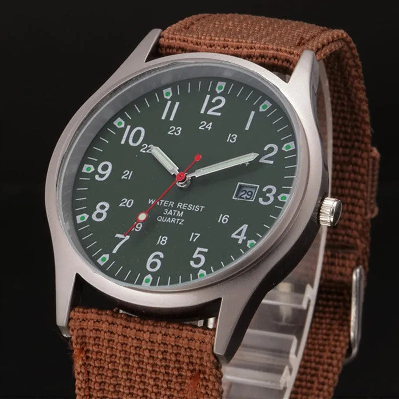 Men's military-style fabric band watch with calendar display and black face