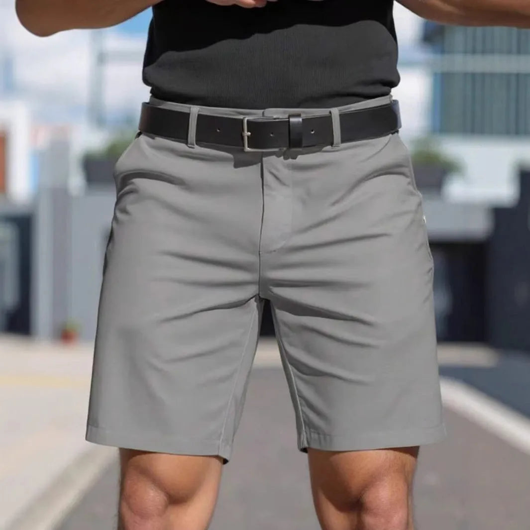 Men's solid colour straight-cut elastic fifth pants in light grey on a hanger.